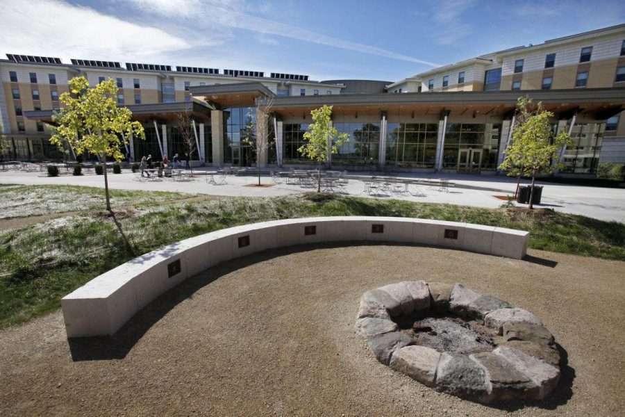 An image of the outdoor fireplace at Dejope residence hall.