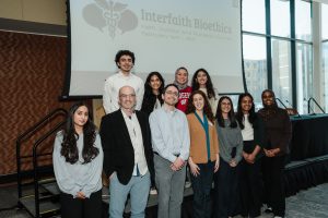Organizers of the conference pose on Saturday, February 14. Front row from left: Iqra Arif, Rev. Michael Burch, Professor Daniel Stolz, Talia Ivry, Khadijah Dhoondia, Naureen Kamal, Ilhan Mohamed. Back row from left: Bilal Khraisat, Suha Muqeet, Salma Ibrahim, Alyshba Sharwani.