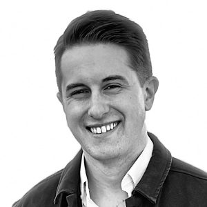 A headshot of Dr. Kennedy smiling.