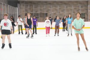 Students ice skating at the Bakke Ice Rink