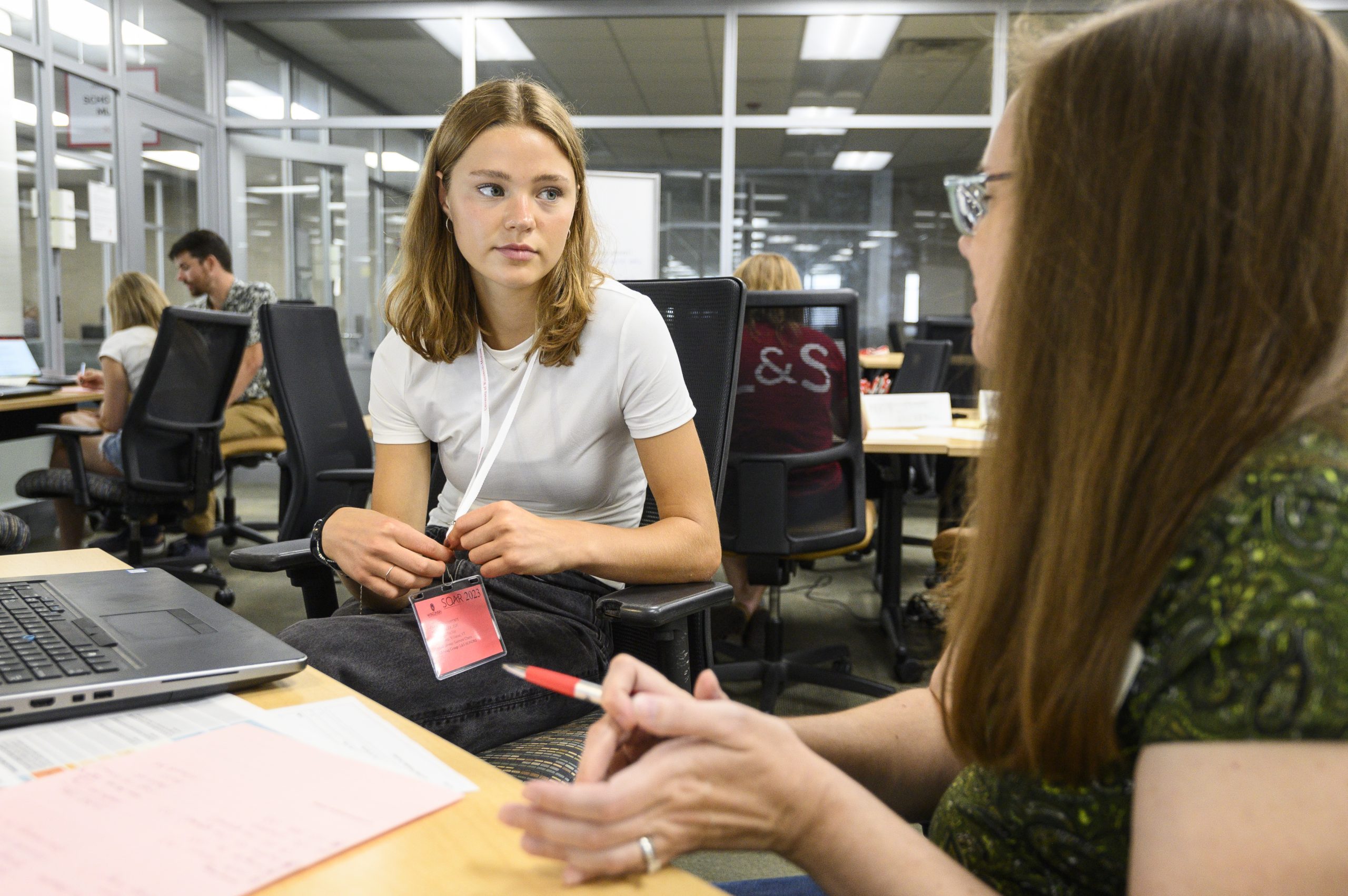 A student engages in an academic advising conversation.